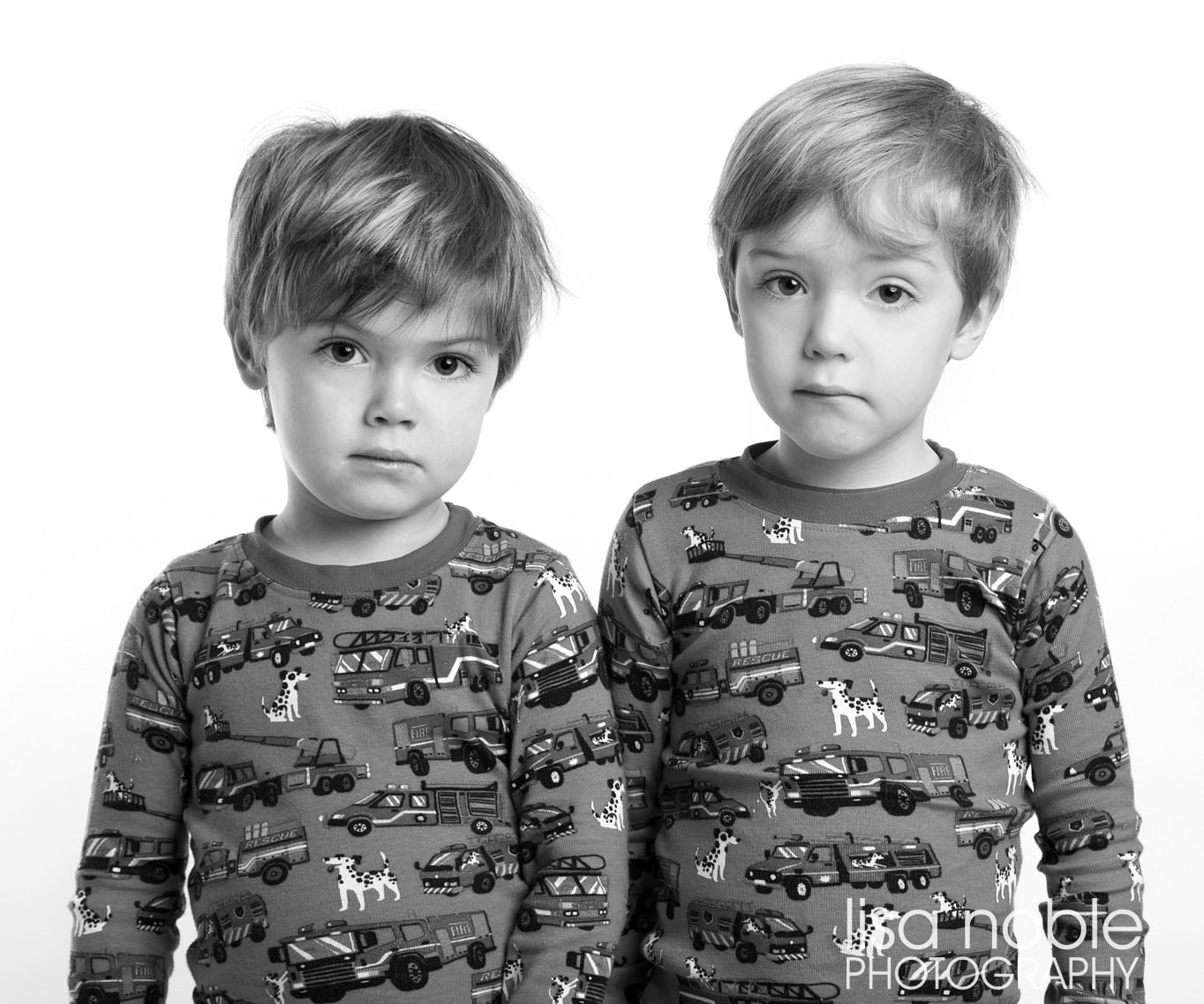 Twins in pajamas for a photography session